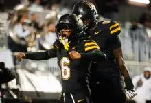 App State players celebrate during the Mountaineers' 26-21 win over Charlotte on Sept. 19-20, 2026, at Kidd Brewer Stadium.