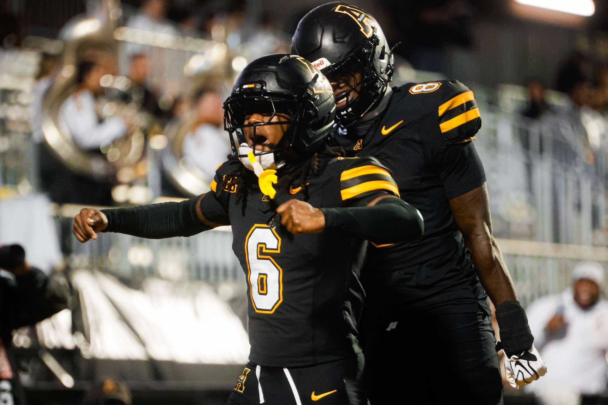 App State players celebrate during the Mountaineers' 26-21 win over Charlotte on Sept. 19-20, 2026, at Kidd Brewer Stadium.