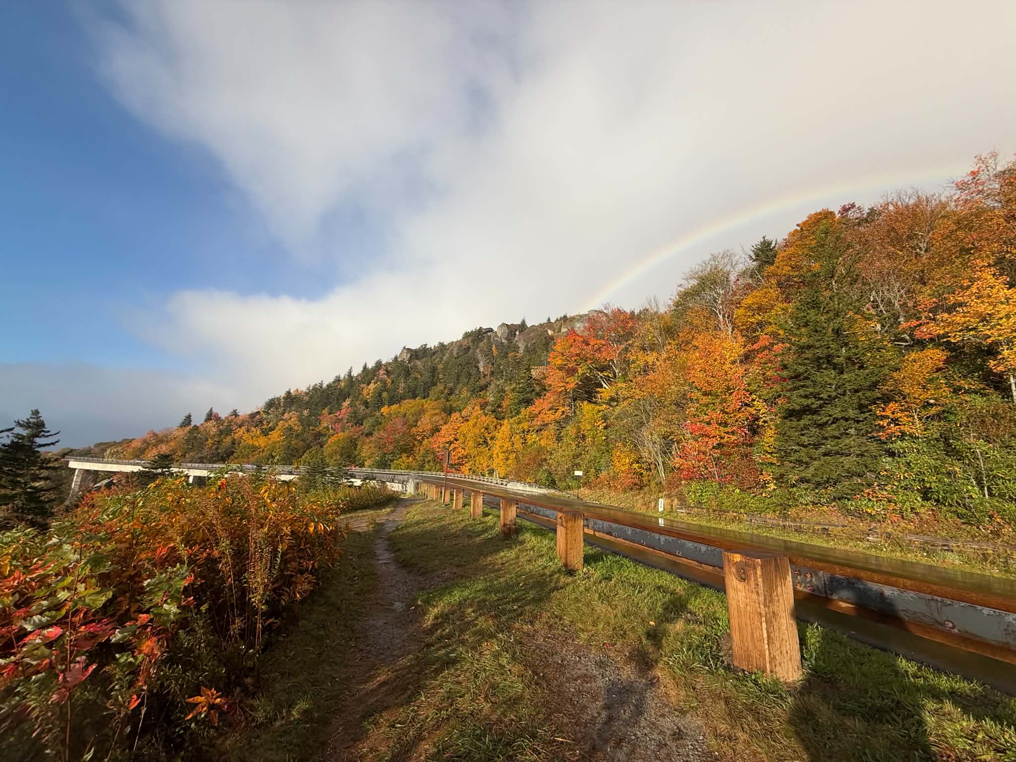 Rainbow over fall color along the Blue Ridge Parkway, photo by Andrea Crouch