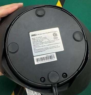 Label on the underside of a recalled DREO DR-HSH015 space heater showing the model number and manufacture date