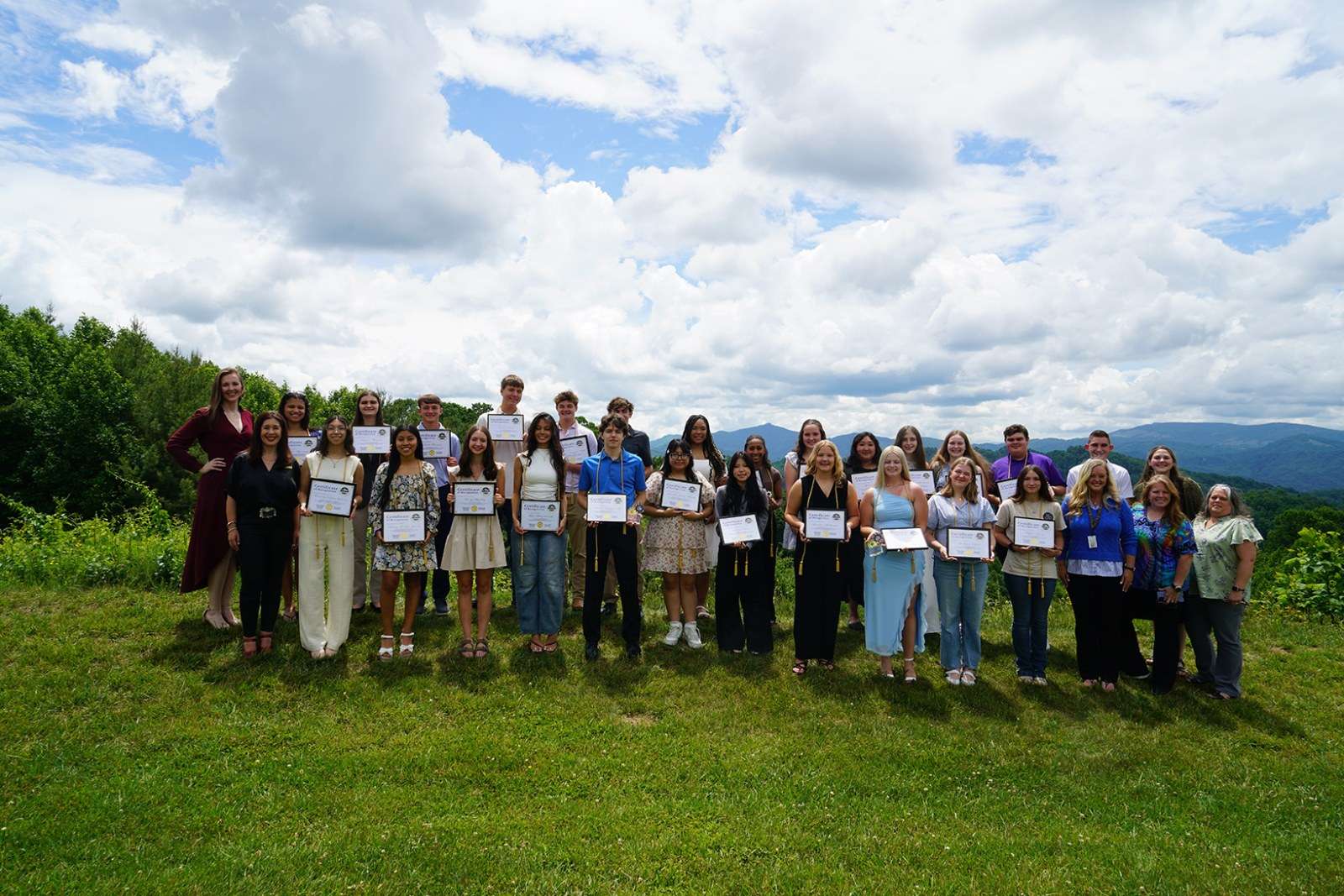 L.E.A.D. scholars display their completion certificates at the GEAR UP L.E.A.D. Coalition graduation