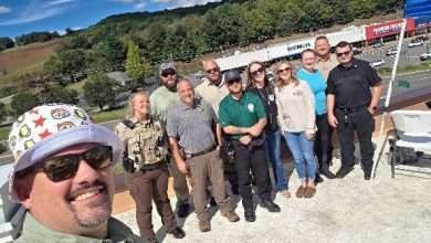 Law enforcement officers and volunteers on the Bojangles roof during the sixth annual Rooftop Cops event in Jefferson.