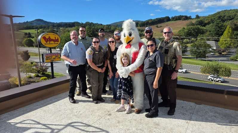 Officers with the Bojangles mascot